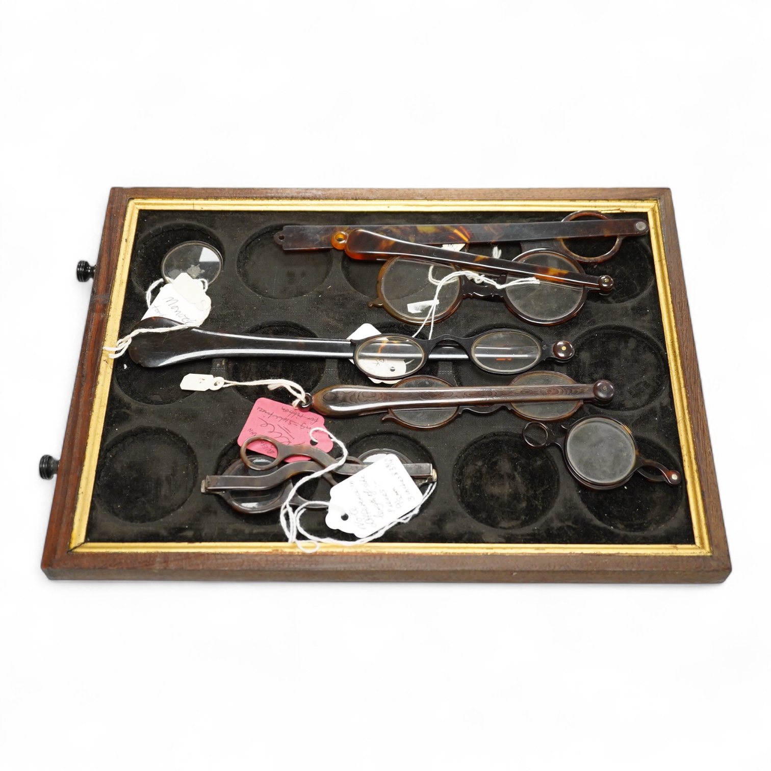 A pair of 18th-century tortoiseshell framed temple spectacles, the silver hinges with maker’s mark ‘CR,’ (one arm shortened) various tortoiseshell and simulated tortoiseshell lorgnettes, a monocle and a pair of scissor s